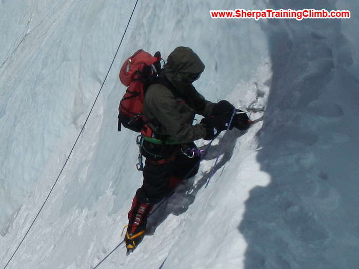 Sherpa fixing rope on Cho Oyu. Photo Mark.