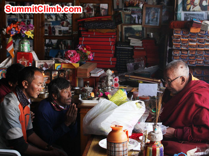 Thile Nuru Sherpa and Lakpa Kongle Sherpa being blessed by Lama Geshe. Photo by Sam Chappatte Thile Nuru Sherpa and Lakpa Kongle Sherpa being blessed by Lama Geshe. Photo by Sam Chappatte