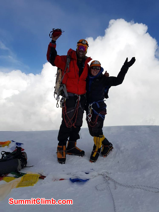 team member waving hand