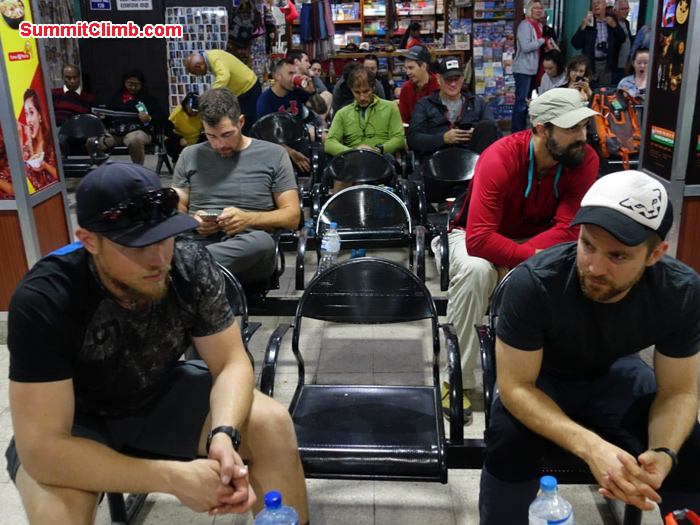 Team members are waiting for heli to fly lukla
