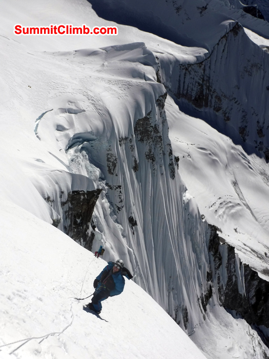Gordon and Jangbu belay down from summit of Baruntse