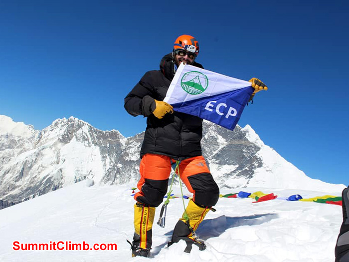 team member showing flag