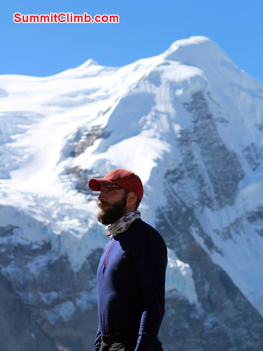 team member with mountain