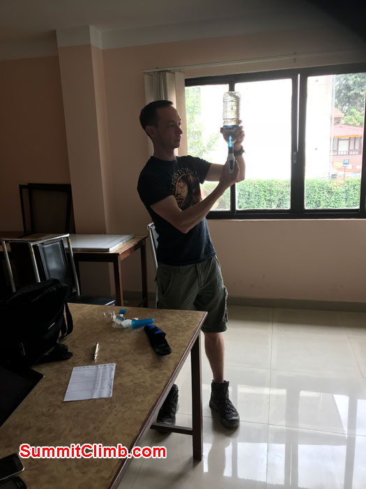 Sam showing how to use steripen for purify the water