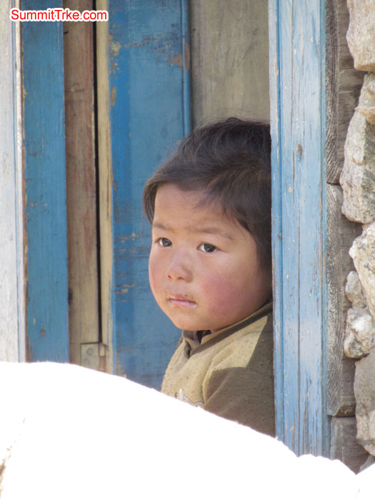 Small kid enjoying the Christmas cap. Photo Aless and Luke