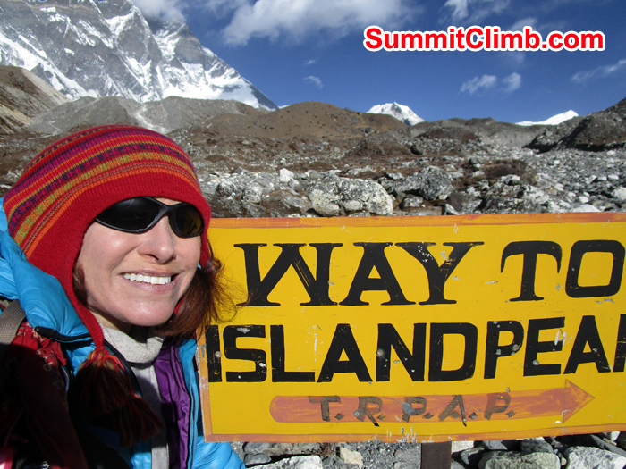 Meryl showing sign for Island Peak. Photo Meryl Lipman