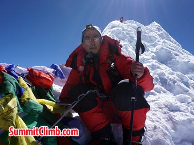 Puwei L. at the summit of Manaslu