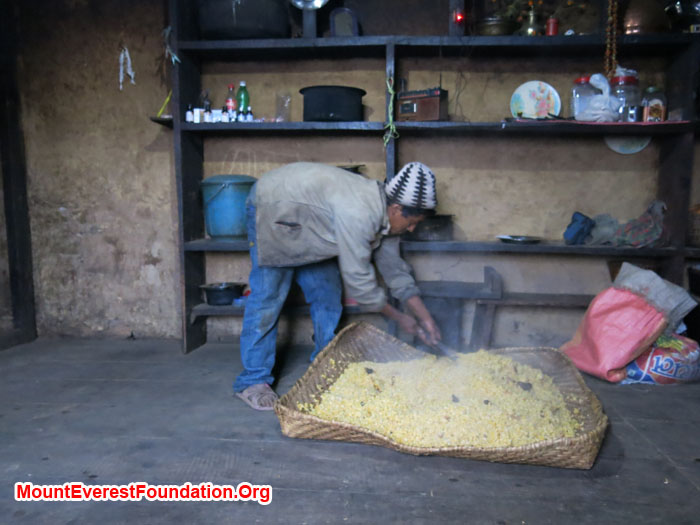 Farmer drying up Corn flower. Photo Daniela Milea